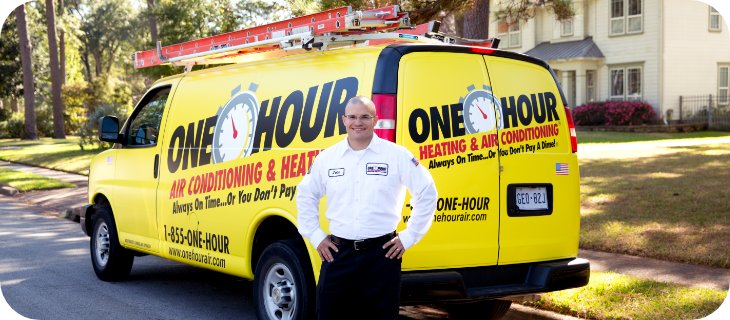 Man standing by service van